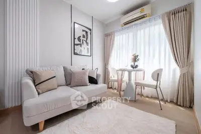Chic and cozy living room with modern decor and natural light