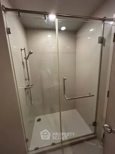 Modern glass shower enclosure in sleek bathroom design