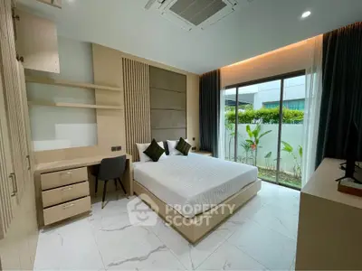 Modern bedroom with garden view, sleek design and natural light