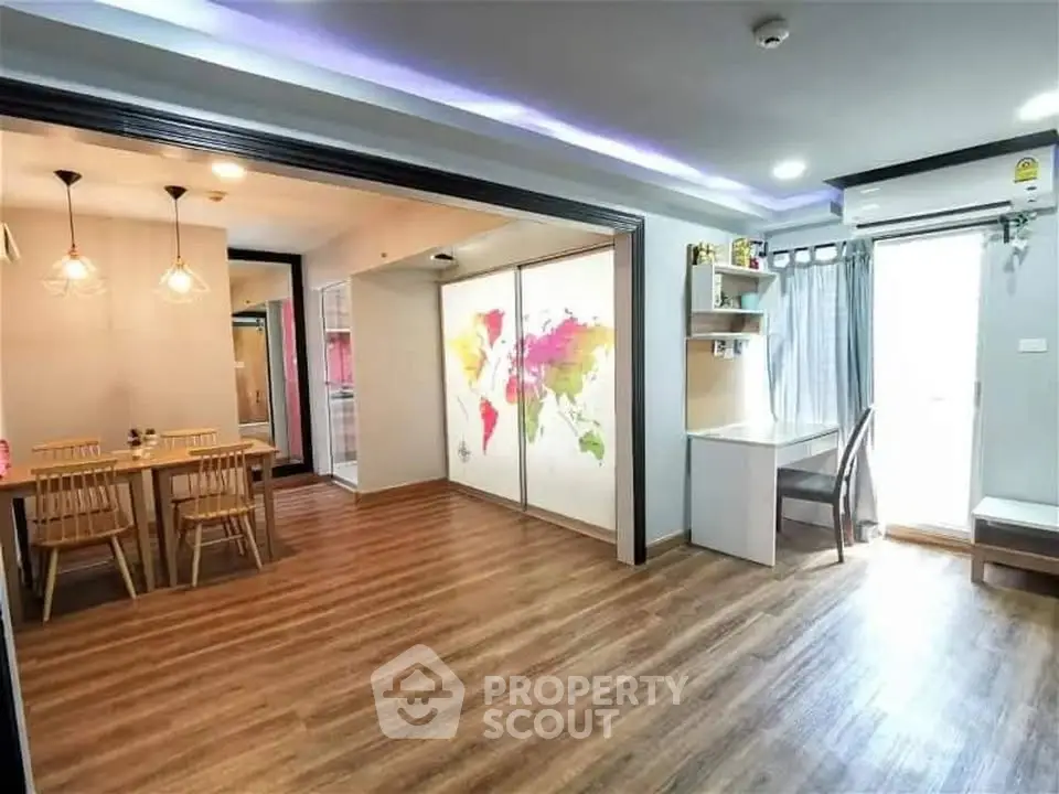 Spacious modern living room with dining area and world map wall art