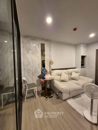 Modern living room with cozy sofa and stylish decor