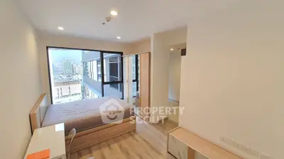 Modern bedroom with city view and minimalist design