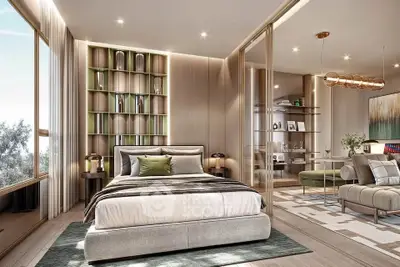 Luxurious modern bedroom with elegant decor and spacious layout, featuring a cozy seating area and large windows.
