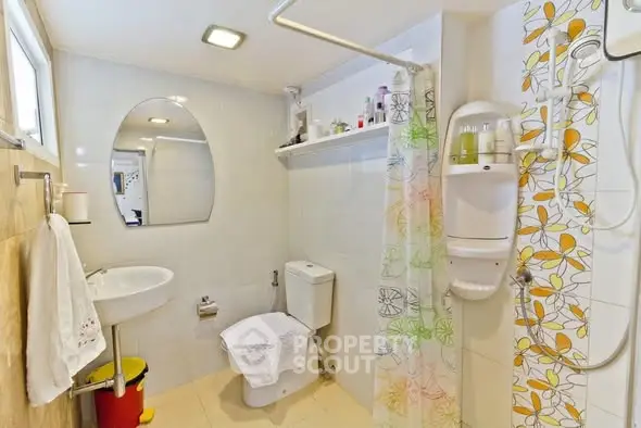 Bright and modern bathroom with shower and stylish decor