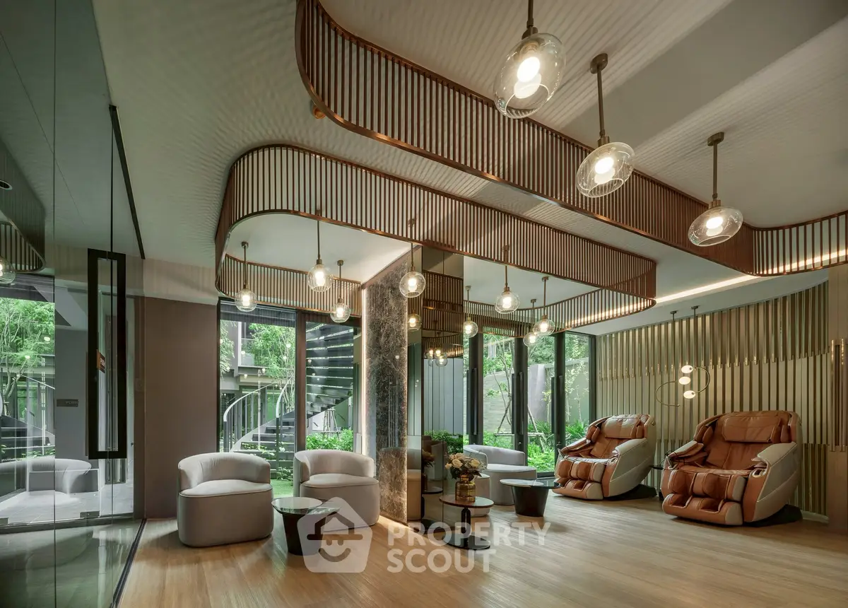 Luxurious modern living room with elegant lighting and plush seating, featuring floor-to-ceiling windows and garden views.