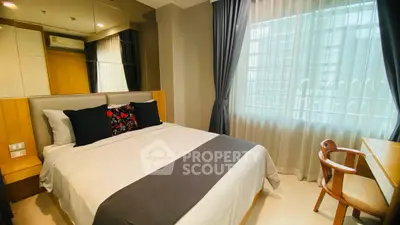 Modern bedroom with elegant decor and natural light