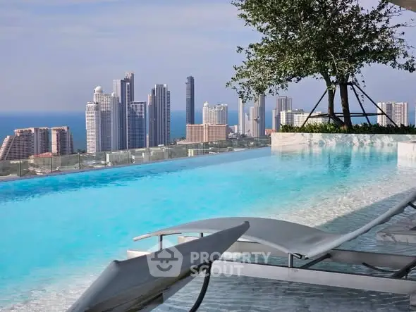 Luxurious rooftop pool with stunning city skyline and ocean view