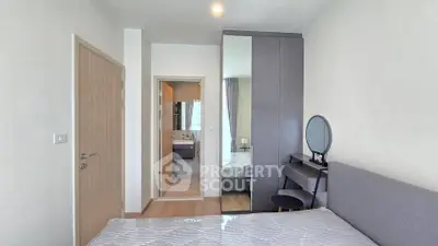 Modern bedroom with ensuite bathroom and sleek furniture design
