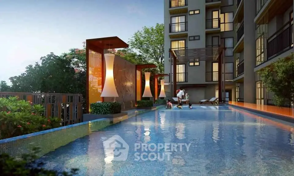 Luxurious apartment building with stunning pool and modern design.