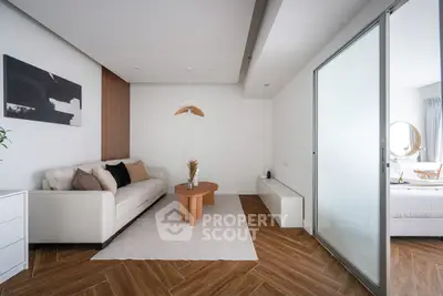 Modern living room with elegant decor and wooden flooring