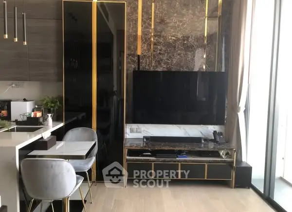 Luxurious modern living room with marble accents and sleek furniture design.