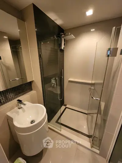 Modern bathroom with sleek glass shower and stylish basin
