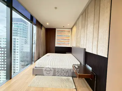 Luxurious modern bedroom with panoramic city view and stylish decor
