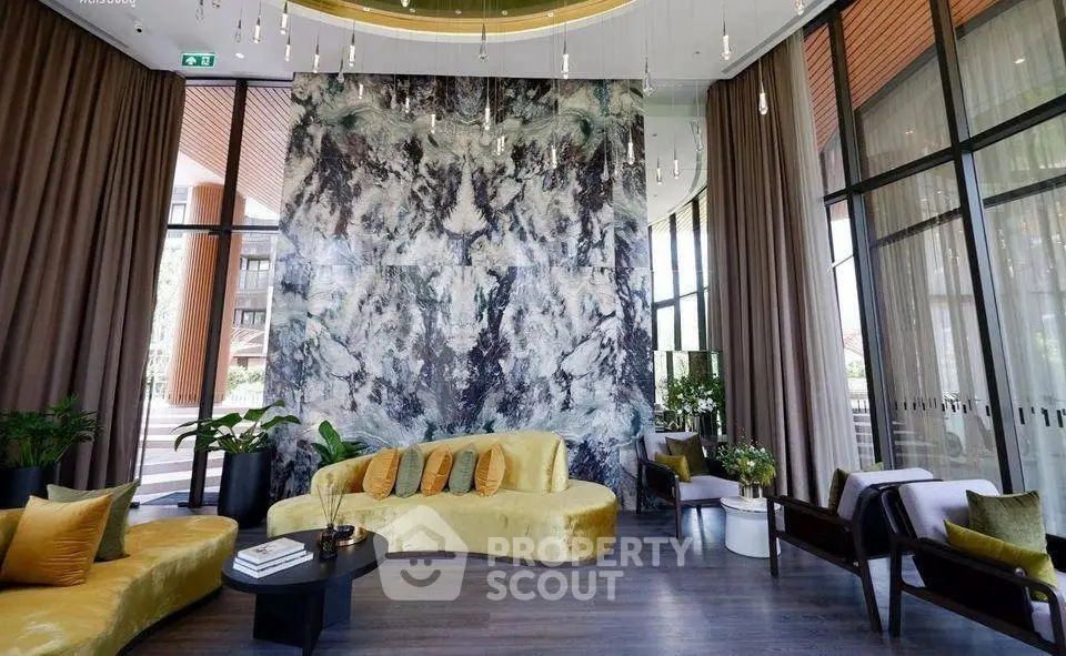Luxurious modern living room with elegant decor and large windows