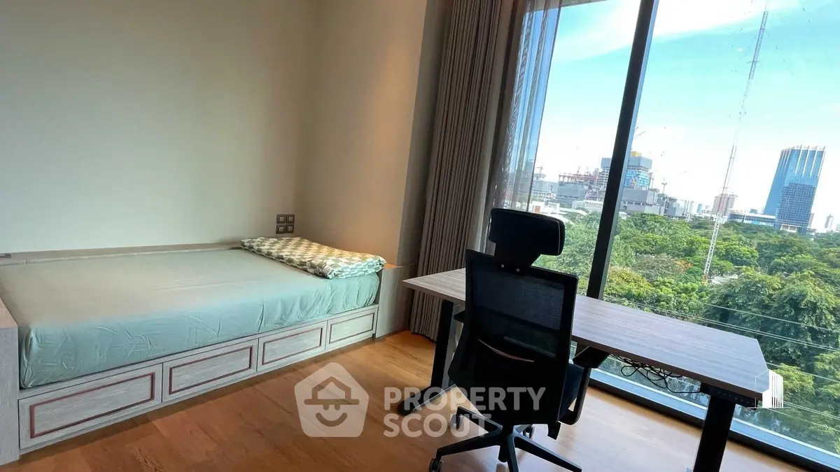 Modern bedroom with study area and stunning city view