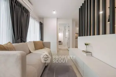 Modern living room with elegant decor and natural light