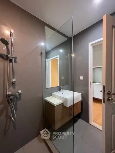 Modern bathroom with sleek design and glass shower enclosure