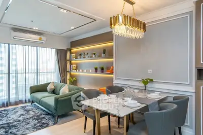 Luxurious living room with elegant dining area and modern decor