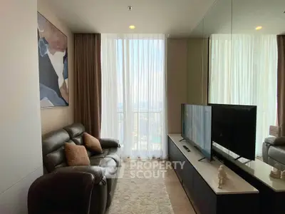 Modern living room with large window and stylish decor