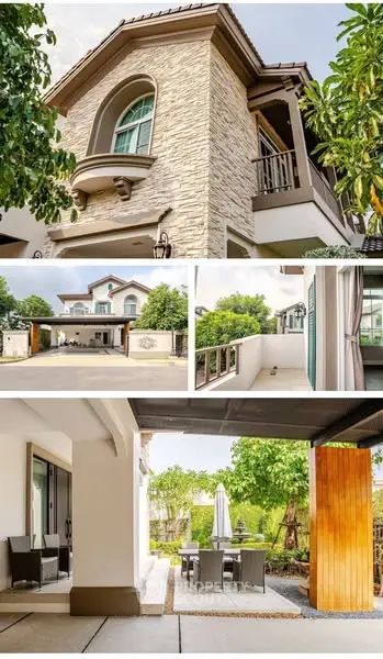 Luxurious two-story home with stone facade, spacious balcony, and elegant outdoor dining area.