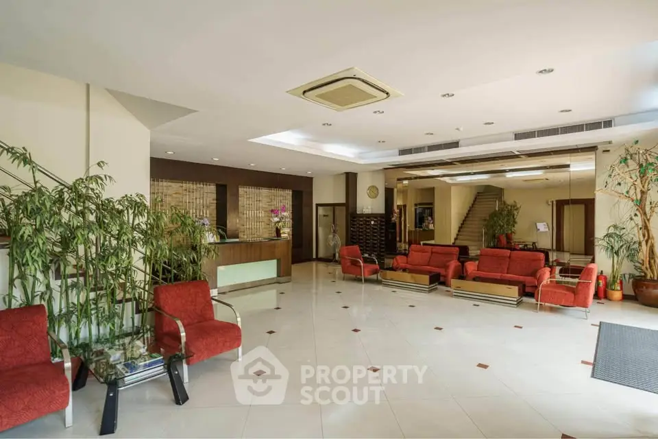 Spacious hotel lobby with modern seating and elegant decor