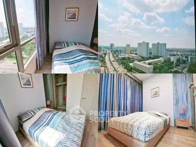 Spacious bedroom with large windows offering stunning city views in a modern apartment.