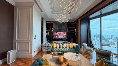 Luxurious living room with stunning city view, elegant decor, and modern furnishings in high-rise apartment.