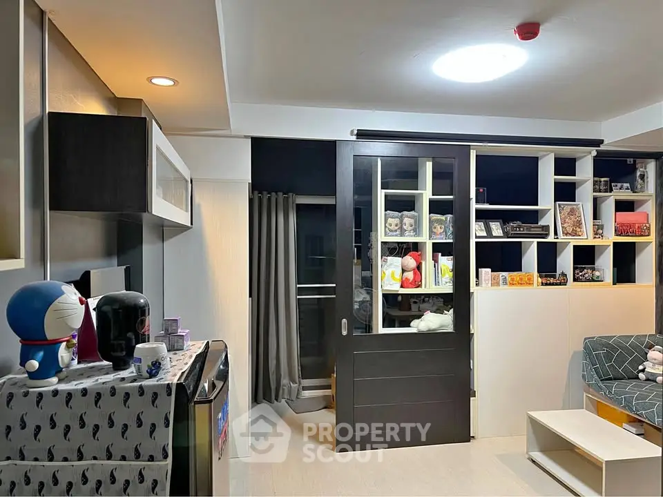 Modern living room with sliding doors and stylish shelving