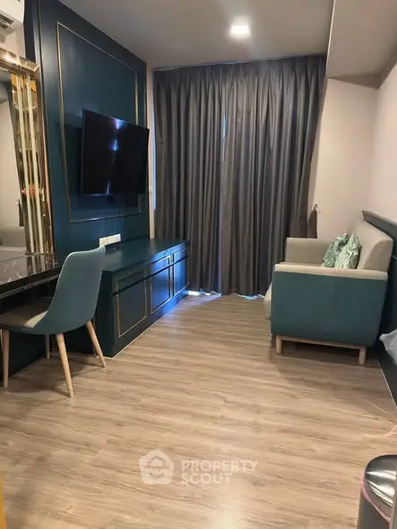 Modern living room with stylish decor and wooden flooring