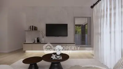 Modern living room with stylish decor and wall-mounted TV, featuring elegant furniture and natural light.