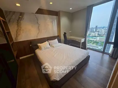 Modern bedroom with city view and stylish decor