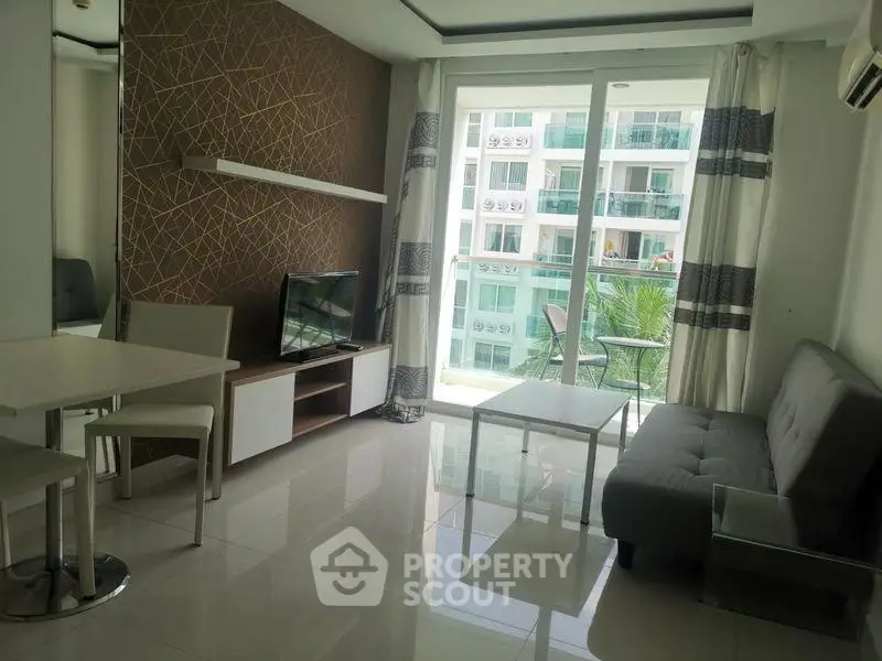 Modern living room with balcony view in stylish apartment