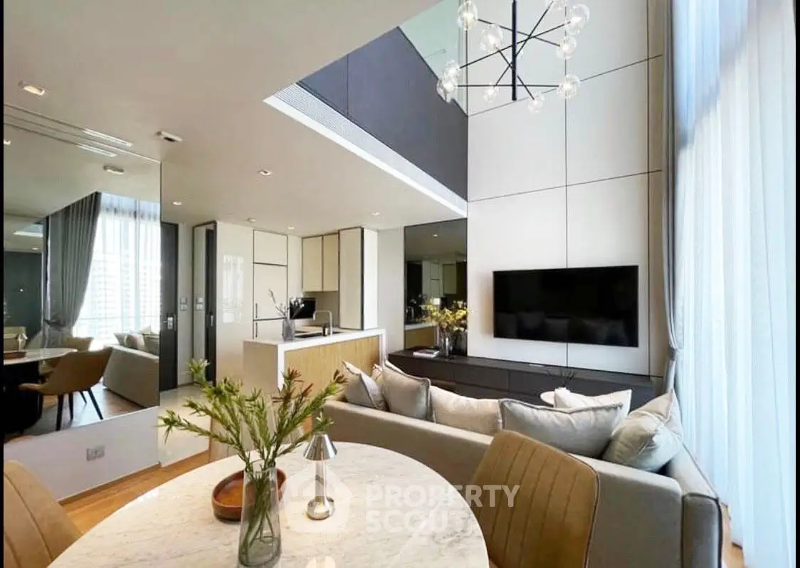 Luxurious modern living room with high ceiling and elegant decor