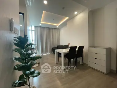 Modern living room with dining area and stylish decor