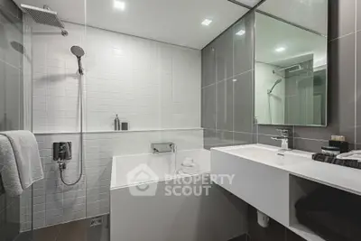 Modern bathroom with sleek design and luxurious bathtub