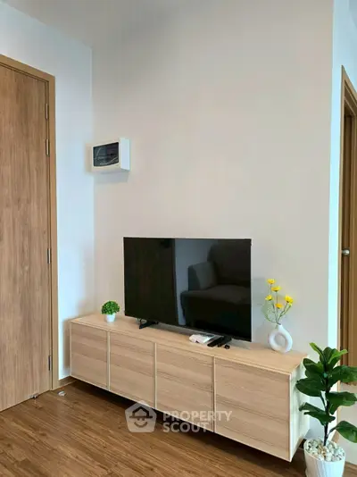Modern living room with sleek TV stand and stylish decor