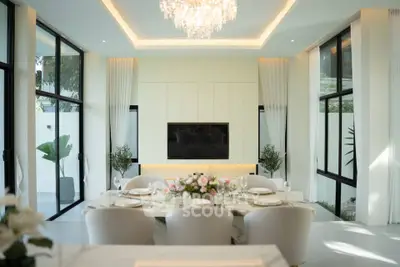 Luxurious dining room with elegant chandelier and modern decor