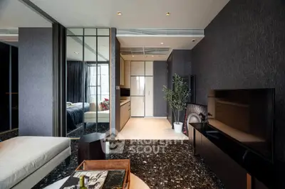 Luxurious modern living room with sleek design and open kitchen layout