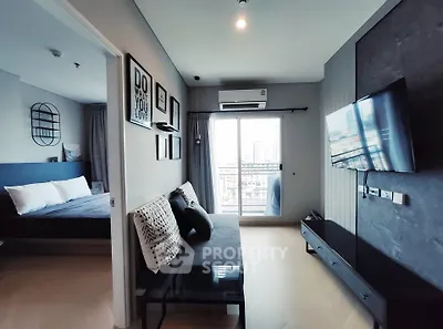 Modern apartment living room with balcony view and stylish decor