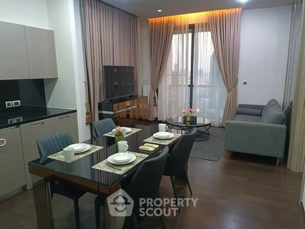 Modern open-layout living room with dining area and stylish decor