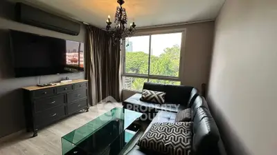 Stylish living room with modern decor and large window view