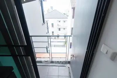 Charming small balcony with urban view in modern apartment
