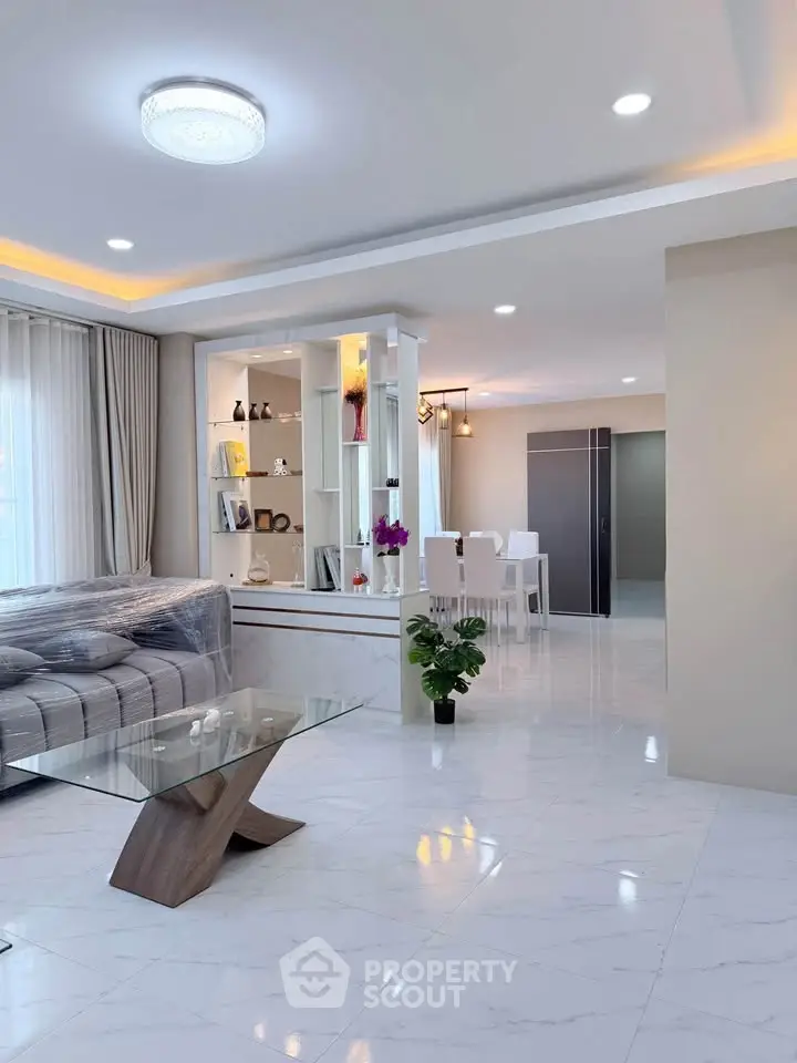 Spacious modern living room with elegant decor and open layout