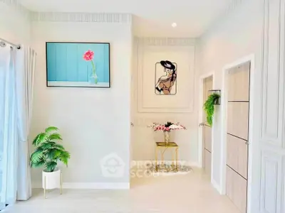 Elegant interior with modern decor and stylish artwork in a bright living space.