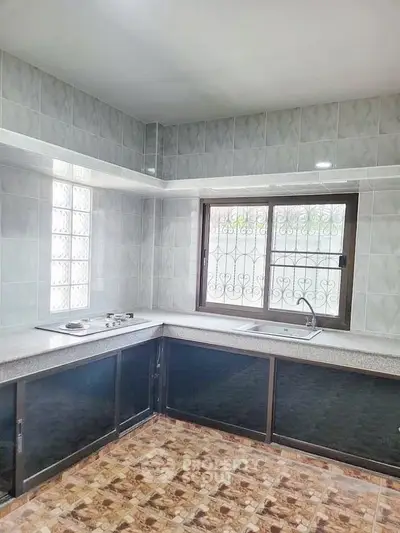 Spacious kitchen with modern design and ample natural light