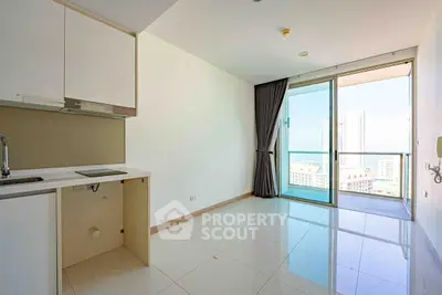 Modern apartment with open kitchen and balcony view