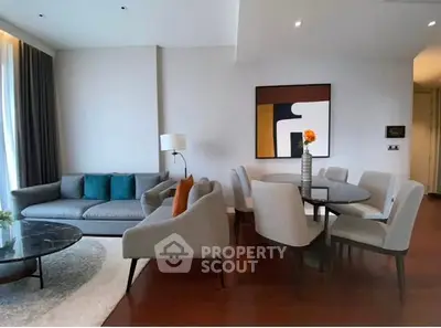 Modern living room with elegant dining area and stylish decor