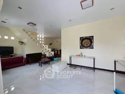 Spacious living room with modern decor and open layout