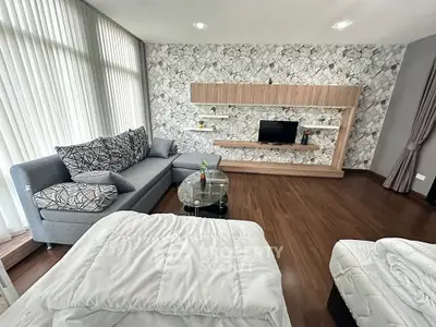 Modern living room with stylish decor and cozy seating area