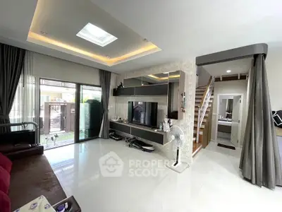 Spacious modern living room with sleek design and natural light